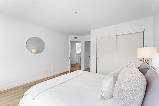 64 Camino, San Jose, San Clemente, CA 92672 - bedroom with wood finished floors, baseboards, and a closet