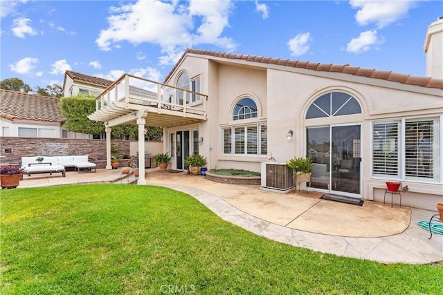 64 Camino, San Jose, San Clemente, CA 92672 - rear view of house with a balcony, a yard, a patio area, an outdoor hangout area, and central air condition unit
