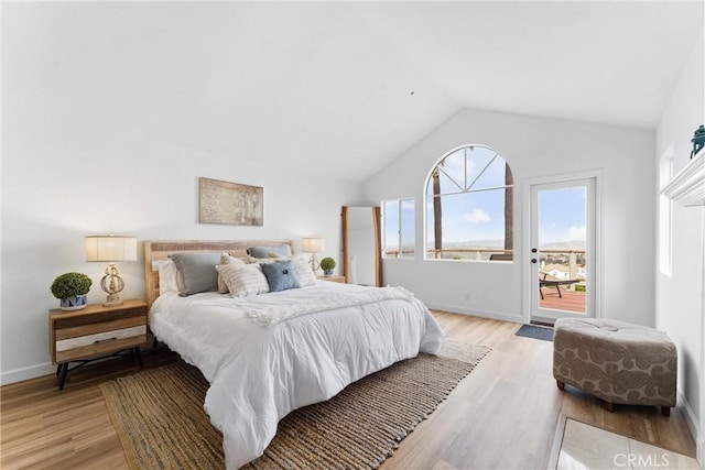 64 Camino, San Jose, San Clemente, CA 92672 - bedroom featuring access to outside, lofted ceiling, light wood-style flooring, and baseboards