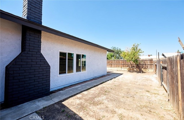 4474 Bartel Dr, Riverside, CA 92503 - view of patio featuring a fenced backyard