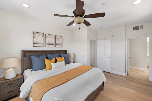 bedroom with light wood-style flooring, baseboards, recessed lighting, and ceiling fan