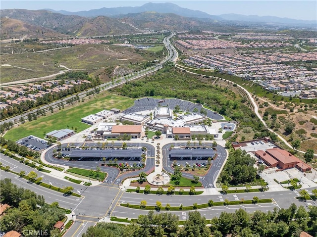 aerial overview of property's location featuring a mountainous background