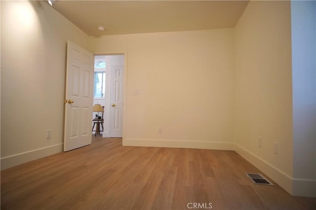 319 Dorn Dr, Crestline, CA 92325 - unfurnished room featuring light wood finished floors, baseboards, and a smoke detector