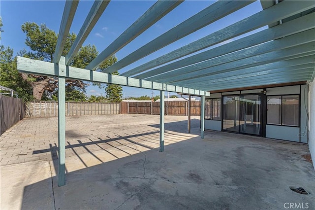 view of patio featuring a fenced backyard and a pergola