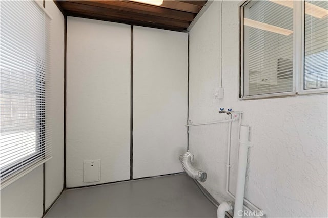bathroom with concrete flooring