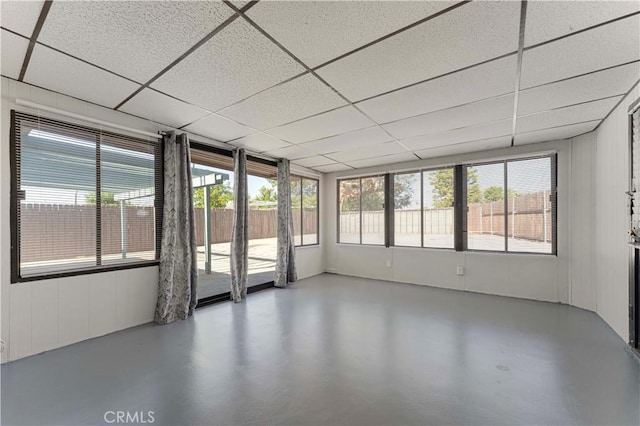 unfurnished sunroom with plenty of natural light