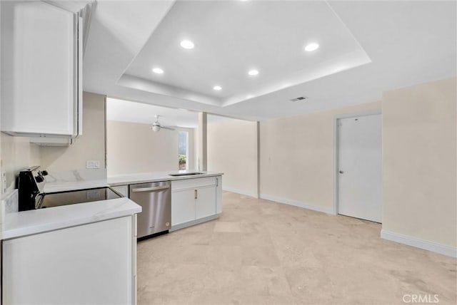 25101 Sebastian Ln, Mission Viejo, CA 92691 - kitchen featuring stainless steel dishwasher, a raised ceiling, white cabinets, light countertops, and recessed lighting