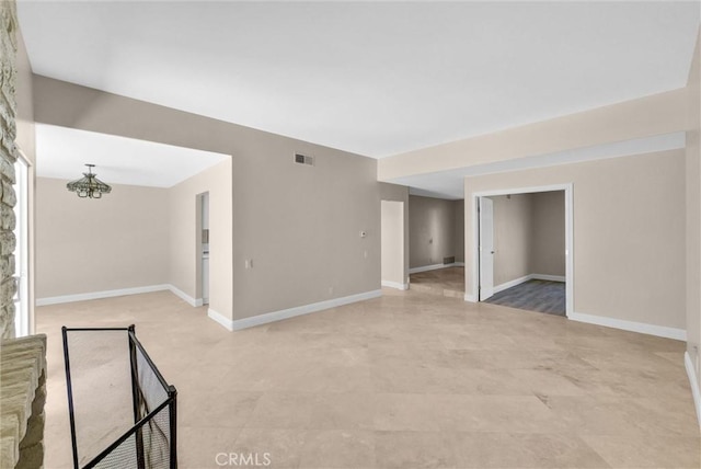25101 Sebastian Ln, Mission Viejo, CA 92691 - spare room featuring baseboards and a chandelier