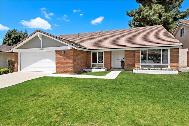 13041 Ranchwood Rd, Tustin, CA 92782 - ranch-style home with a garage, a front yard, and concrete driveway