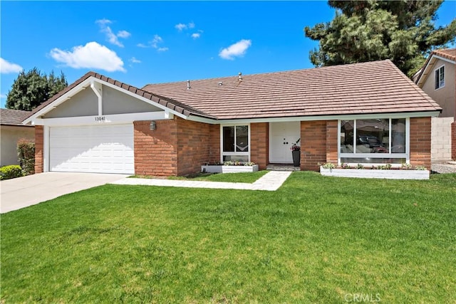 13041 Ranchwood Rd, Tustin, CA 92782 - ranch-style home featuring an attached garage, a front yard, and driveway