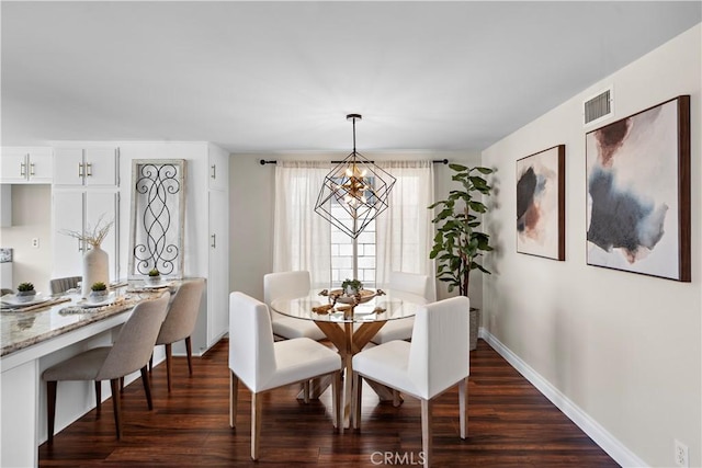 13041 Ranchwood Rd, Tustin, CA 92782 - dining room with baseboards, dark wood-style flooring, and a chandelier