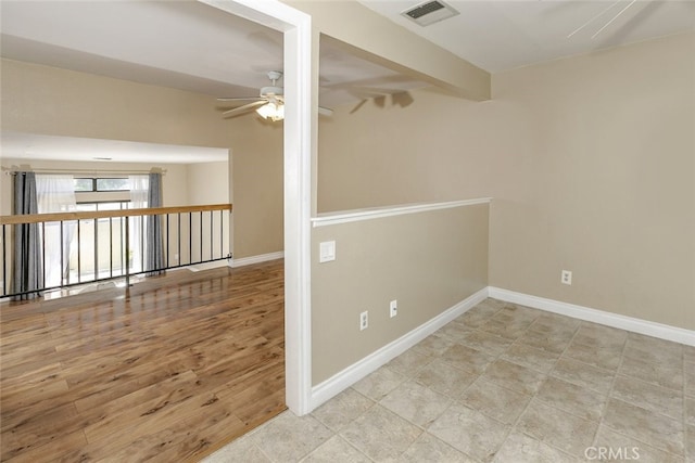 20737 Roscoe Blvd Unit 102, Winnetka, CA 91306 - empty room with a ceiling fan and baseboards