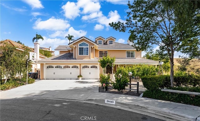 24449 Nan Ct, Diamond Bar, CA 91765 - view of front of property with concrete driveway and an attached garage
