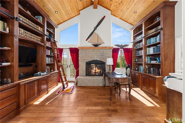 24449 Nan Ct, Diamond Bar, CA 91765 - sitting room with wooden ceiling with exposed beams, a stone fireplace, light wood finished floors, and high vaulted ceiling