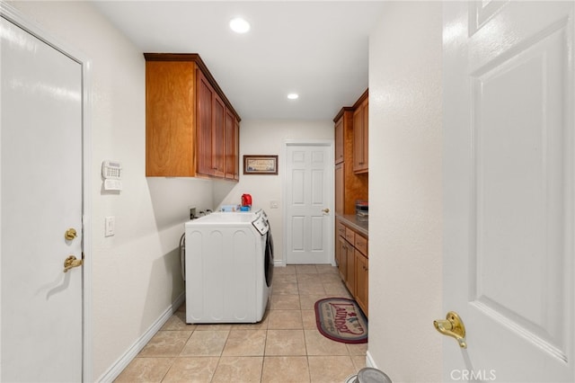 24449 Nan Ct, Diamond Bar, CA 91765 - laundry room featuring cabinet space, light tile patterned floors, baseboards, recessed lighting, and separate washer and dryer