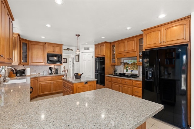 24449 Nan Ct, Diamond Bar, CA 91765 - kitchen featuring black appliances, a sink, backsplash, brown cabinets, and recessed lighting