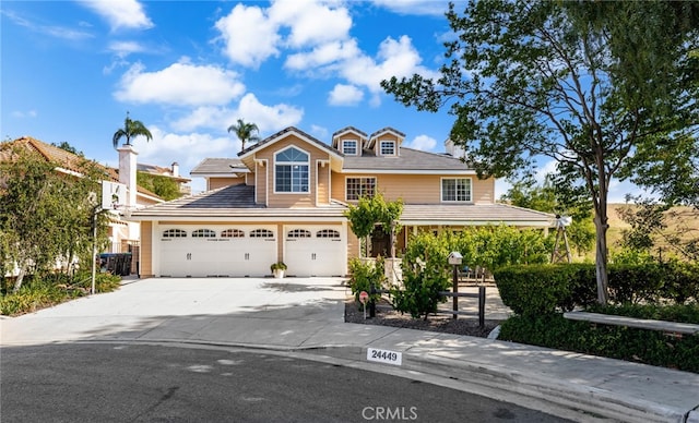 24449 Nan Ct, Diamond Bar, CA 91765 - view of front of house featuring concrete driveway and an attached garage