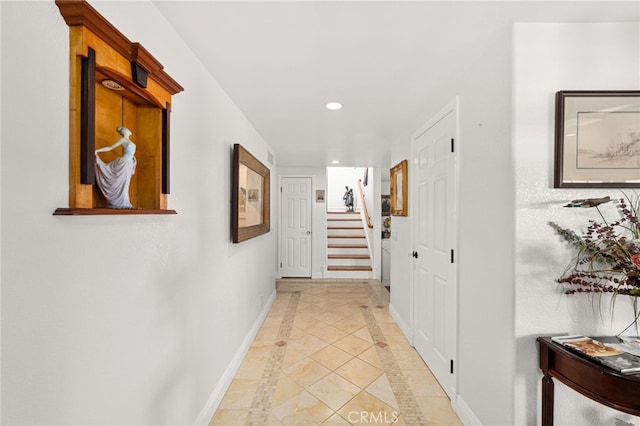 24449 Nan Ct, Diamond Bar, CA 91765 - corridor with inlaid floor details, recessed lighting, baseboards, stairway, and light tile patterned flooring