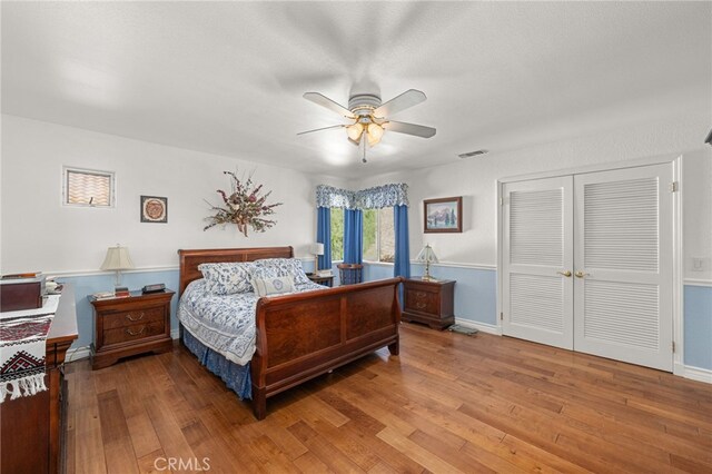 24449 Nan Ct, Diamond Bar, CA 91765 - bedroom featuring hardwood / wood-style flooring, a closet, baseboards, and ceiling fan