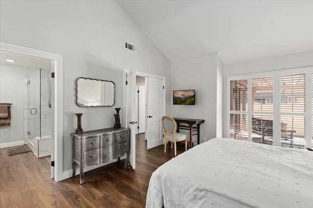 bedroom featuring wood finished floors, baseboards, and high vaulted ceiling