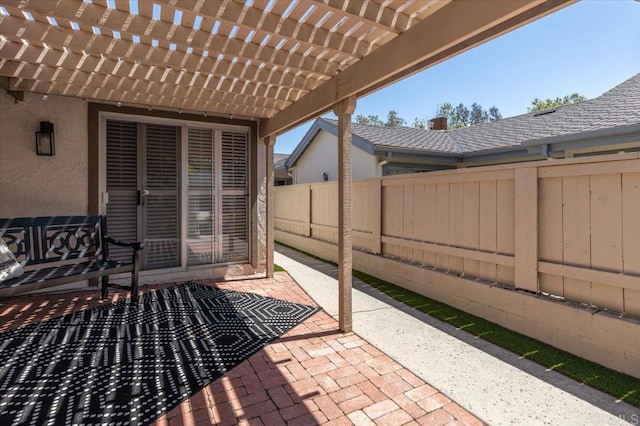 view of patio featuring a pergola and a fenced backyard