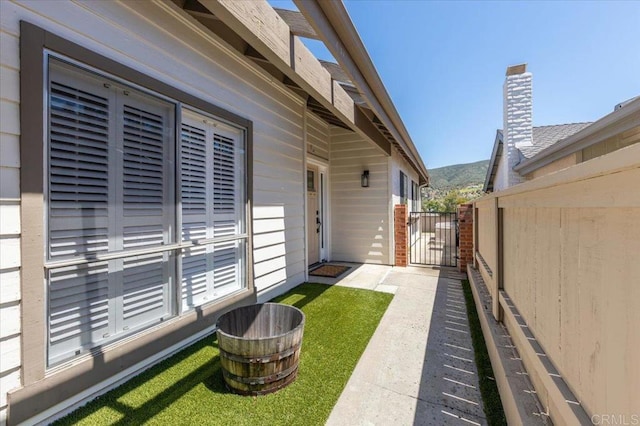 view of yard featuring a gate and fence