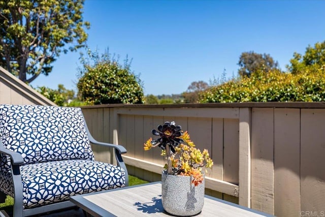 wooden deck featuring outdoor dining area