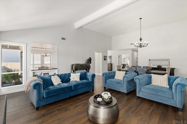 living area featuring a chandelier and dark wood-type flooring