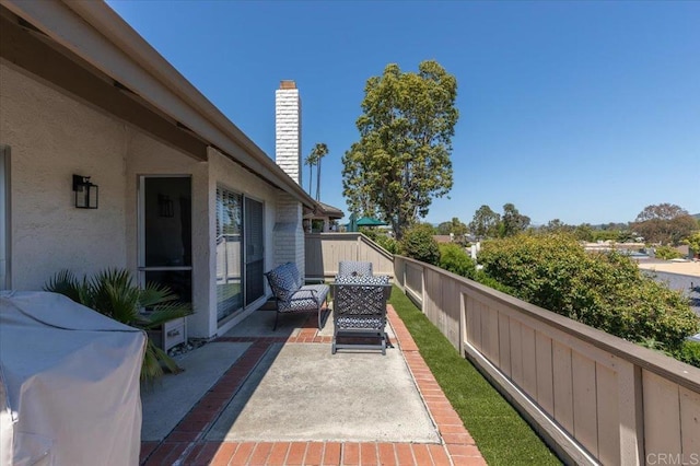 view of patio / terrace with fence