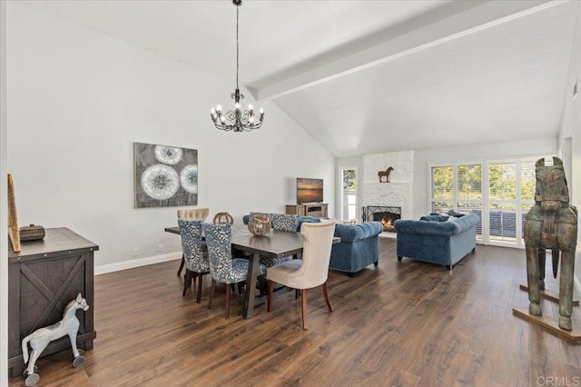dining space with a chandelier, dark wood-style floors, baseboards, and a fireplace