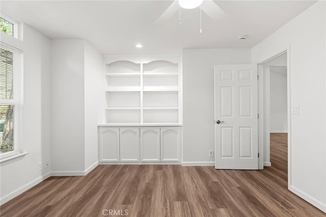 6175 Showdown Cir, Magalia, CA 95954 - unfurnished bedroom featuring wood finished floors, baseboards, and ceiling fan