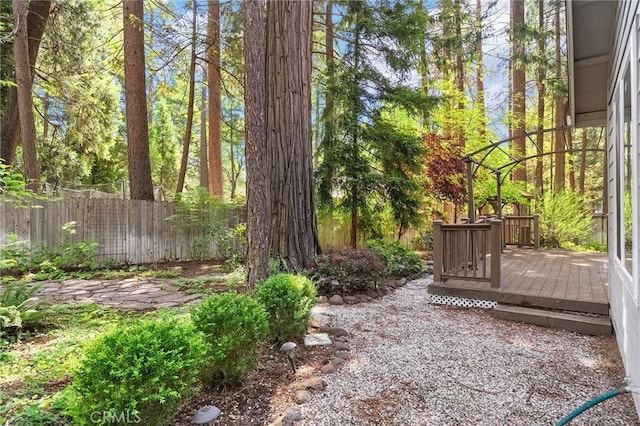 6175 Showdown Cir, Magalia, CA 95954 - view of yard featuring fence and a wooden deck