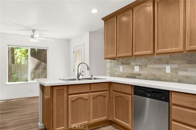 6175 Showdown Cir, Magalia, CA 95954 - kitchen with dishwasher, a peninsula, a sink, decorative backsplash, and light countertops