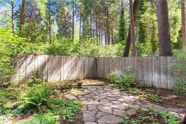 6175 Showdown Cir, Magalia, CA 95954 - fenced backyard featuring a patio