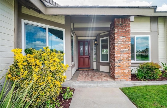 property entrance featuring covered porch