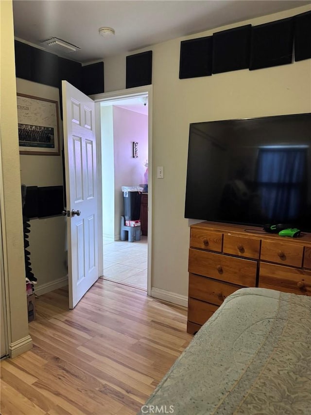 7881 Franklin St, Buena Park, CA 90621 - bedroom with light wood finished floors and baseboards