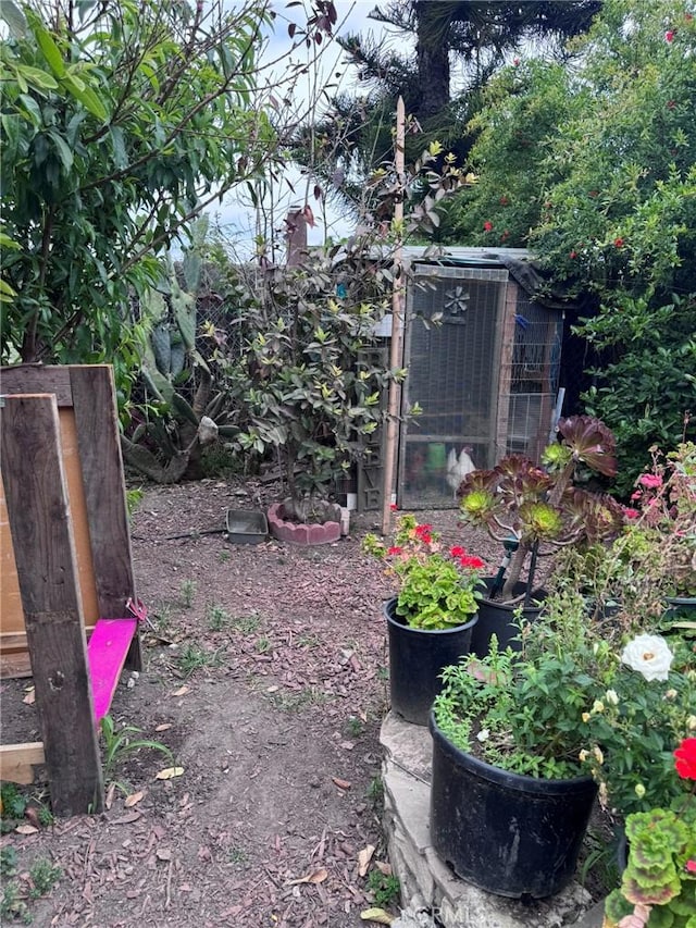 7881 Franklin St, Buena Park, CA 90621 - view of yard featuring an outdoor structure, exterior structure, and central air condition unit
