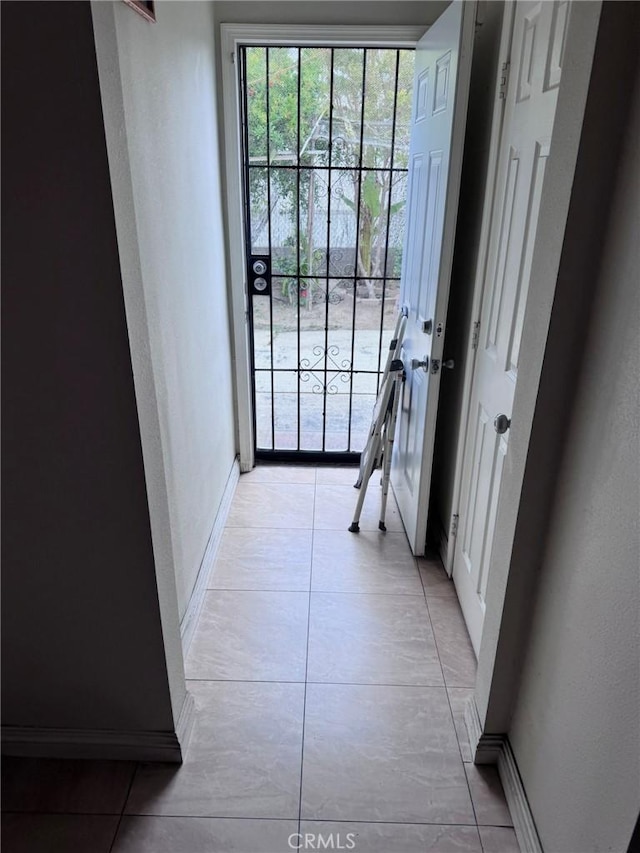 7881 Franklin St, Buena Park, CA 90621 - entryway featuring baseboards and light tile patterned floors