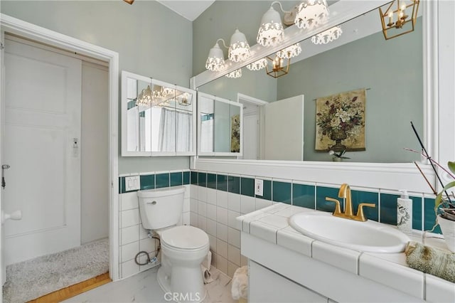 1 Jib St Unit 103, Marina Del Rey, CA 90292 - bathroom with a chandelier, vanity, marble finish flooring, toilet, and a shower
