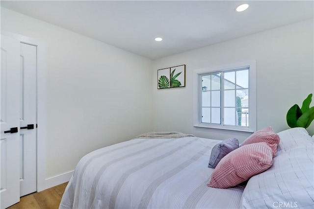 10612 Ketch Ave, Garden Grove, CA 92843 - bedroom with light wood-type flooring and recessed lighting