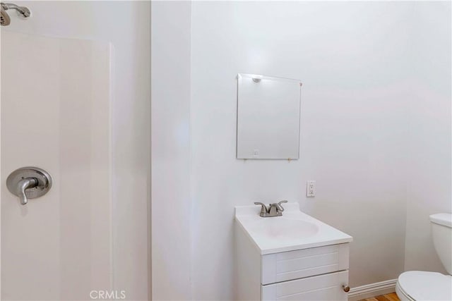 1720 W 25th St, Los Angeles, CA 90018 - full bathroom featuring toilet, vanity, and a shower