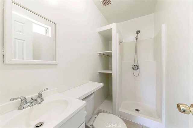 1720 W 25th St, Los Angeles, CA 90018 - bathroom with a shower stall, toilet, and vanity