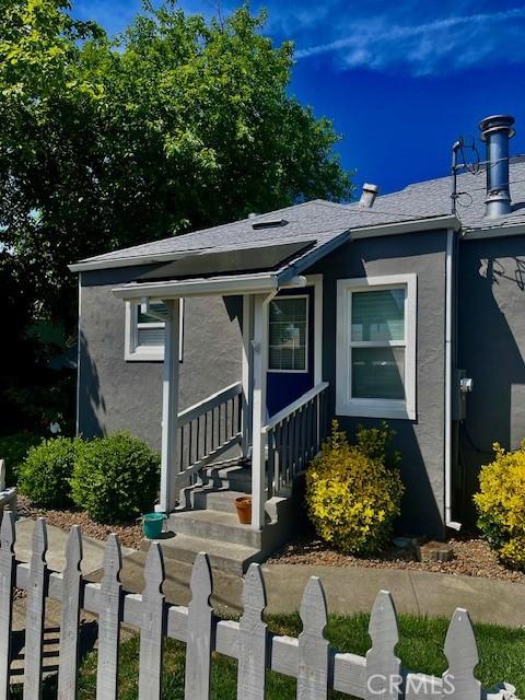1201 S St, Corning, CA 96021 - view of front of home featuring stucco siding