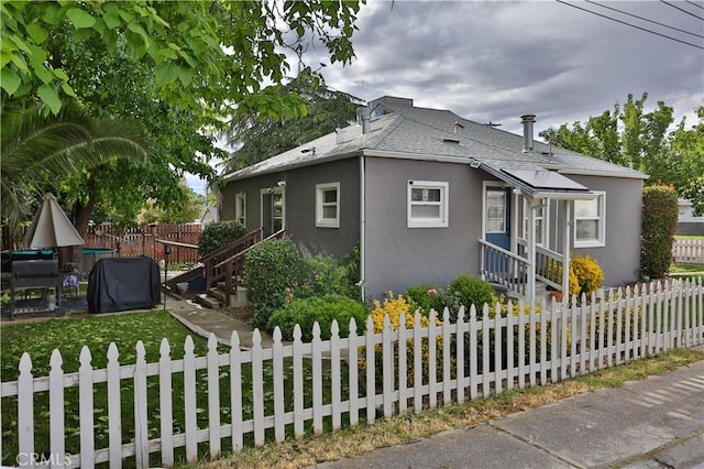 1201 S St, Corning, CA 96021 - view of front of house featuring stucco siding and a shingled roof