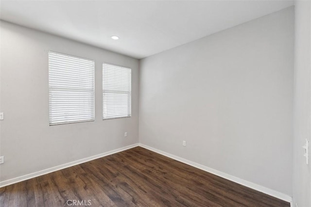 19505 Empire Ln, Northridge, CA 91324 - spare room with baseboards, dark wood-style floors, and recessed lighting