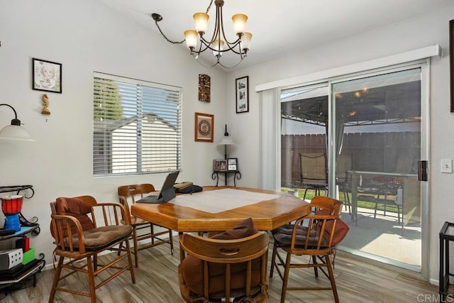 4616 Arrowhead Ct, Oceanside, CA 92056 - dining space featuring a chandelier, healthy amount of natural light, and wood finished floors