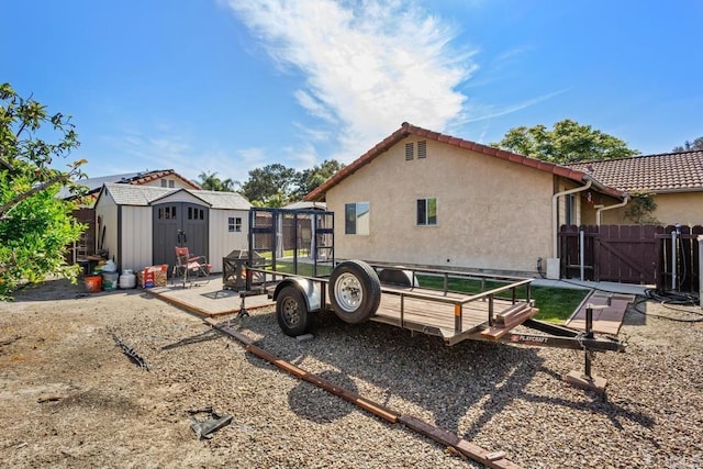 4616 Arrowhead Ct, Oceanside, CA 92056 - back of house with a gate, stucco siding, and a tile roof