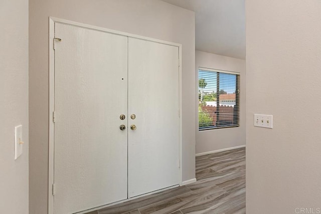 4616 Arrowhead Ct, Oceanside, CA 92056 - entrance foyer featuring wood finished floors and baseboards