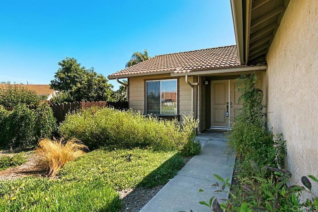 4616 Arrowhead Ct, Oceanside, CA 92056 - doorway to property featuring a tiled roof and stucco siding