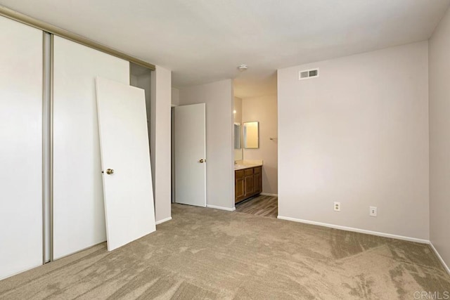 4616 Arrowhead Ct, Oceanside, CA 92056 - unfurnished bedroom with carpet, baseboards, ensuite bathroom, and a closet